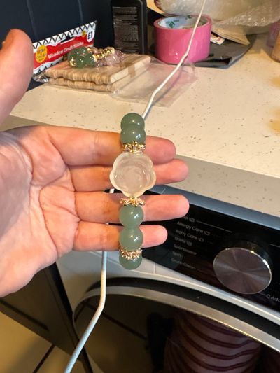 Green Beaded Bracelet With Central Carved Stone