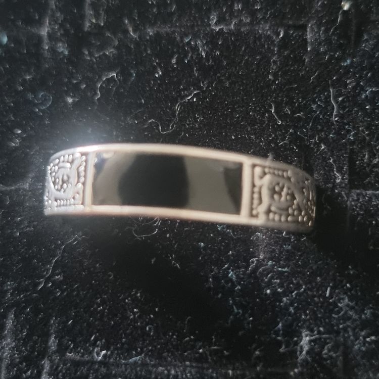 Silver Ring With Black Inlay And Decorative Engravings