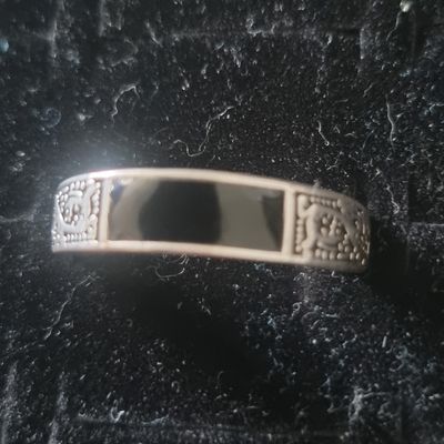 Silver Ring With Black Inlay And Decorative Engravings