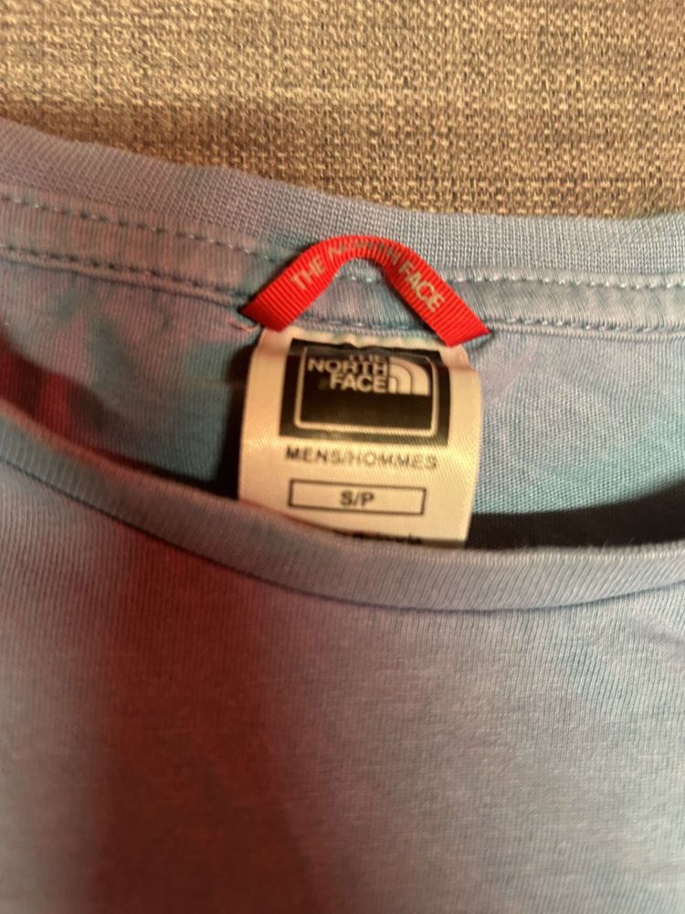 Light blue north face T-shirt 
