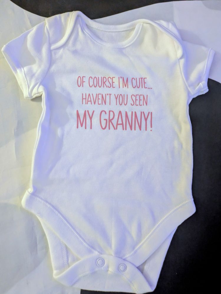 White Baby Bodysuit With Cute Slogan image 1
