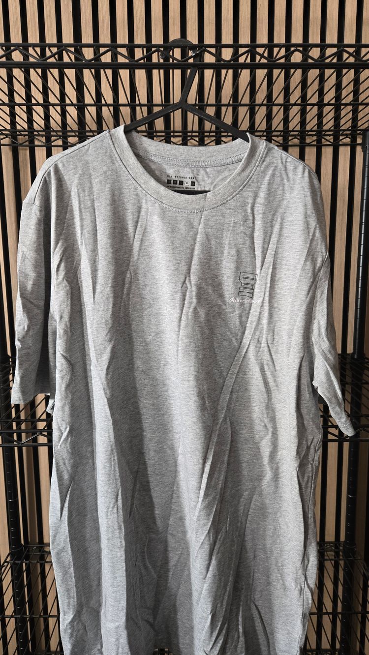 B129 DJK International Script Logo Tee Brand New