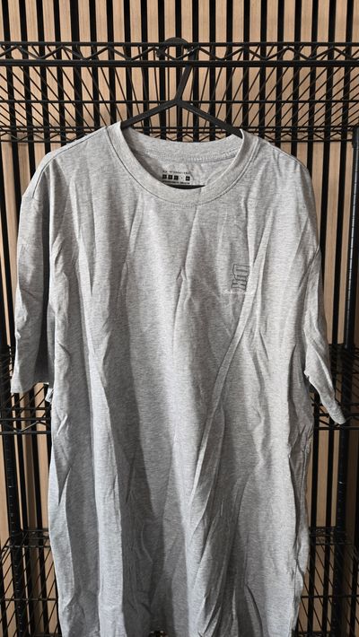 B129 DJK International Script Logo Tee Brand New