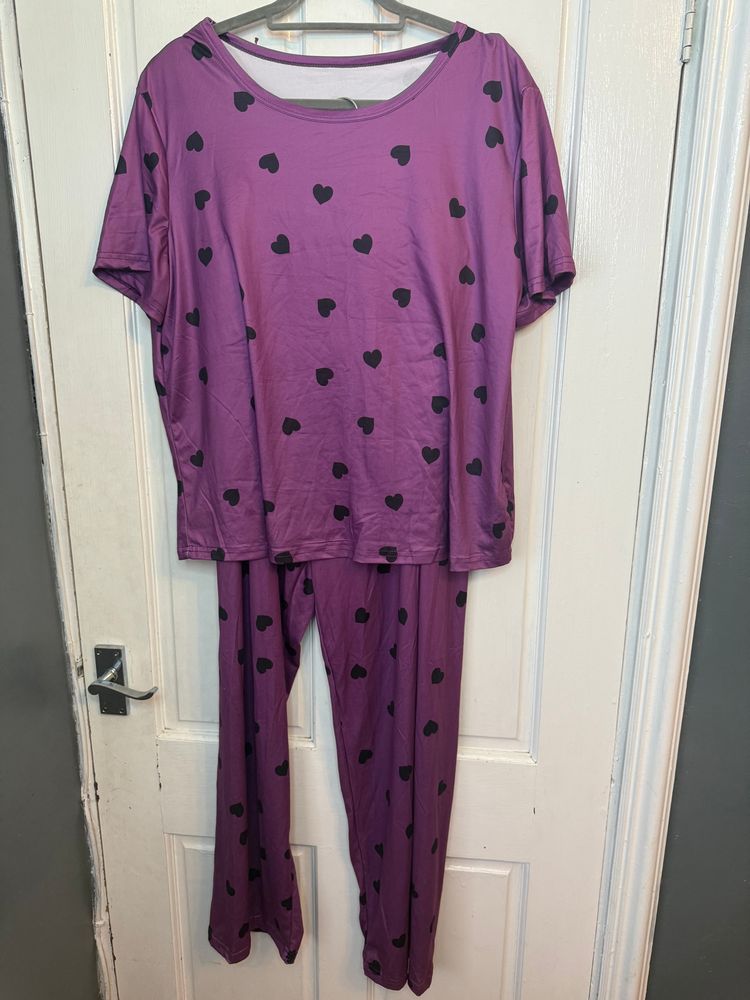 purple pajama set with black heart pattern