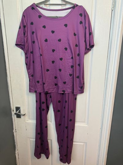 purple pajama set with black heart pattern