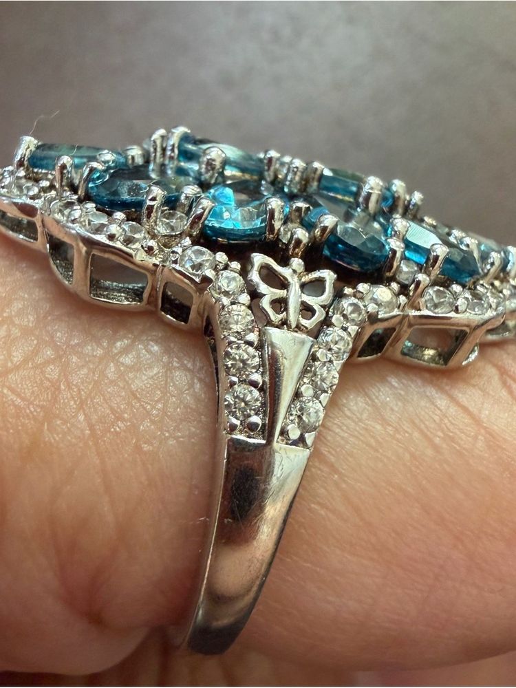 Silver Ring With Blue Stones And Butterfly Design