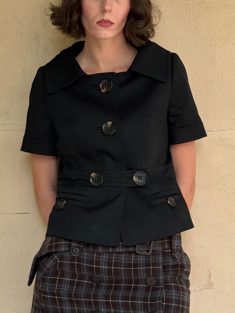 black short sleeve buttoned jacket and