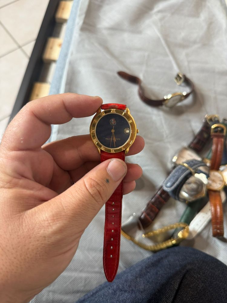 red leather strap wristwatch