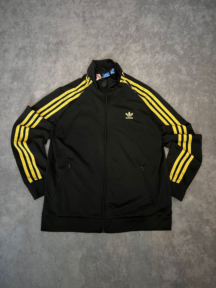 Adidas Black Jacket With Gold Stripes image 1