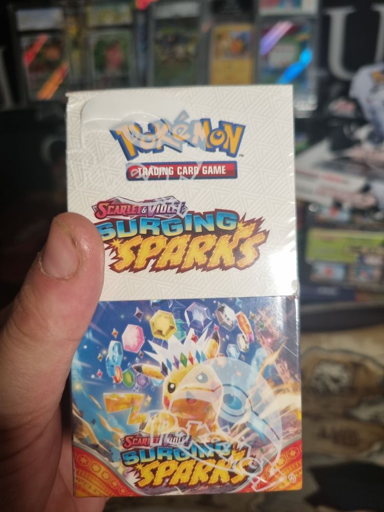 Rip a full box of Scarlet & Violet Surging Sparks Booster Box