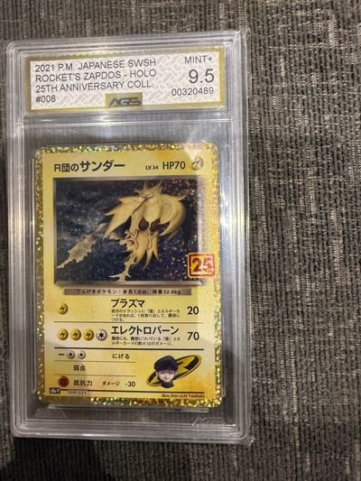 Japanese Pokémon Card Rocket'S Zapdos 25Th Anniversary