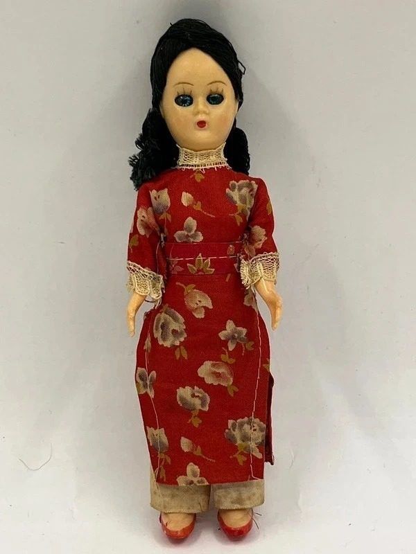 Doll In Red Floral Dress image 1