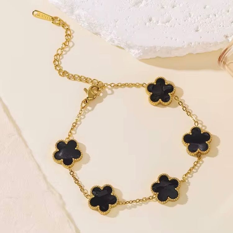 Gold-Tone Bracelet With Black Flower Charms image 1