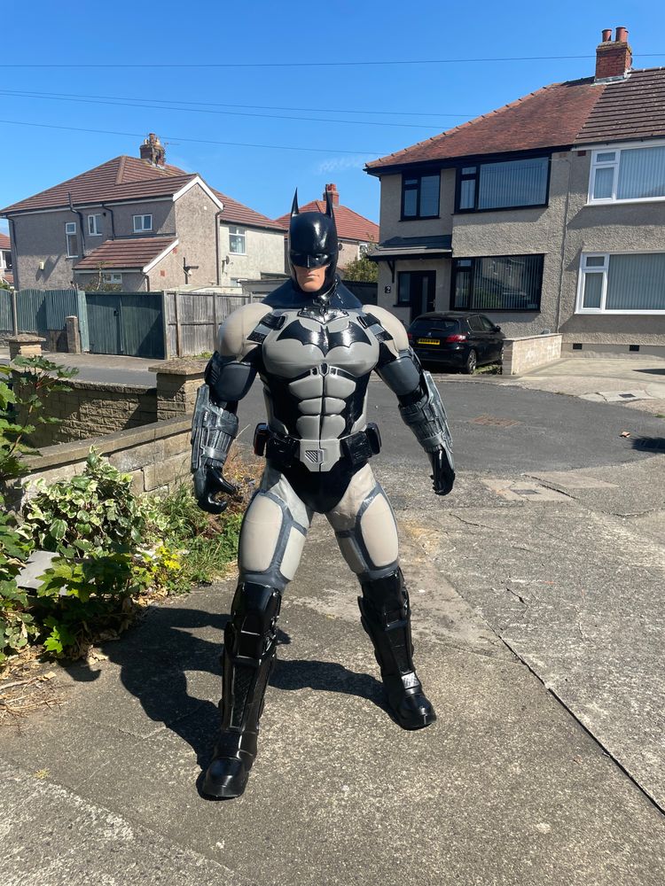 A bat man with bat logo 