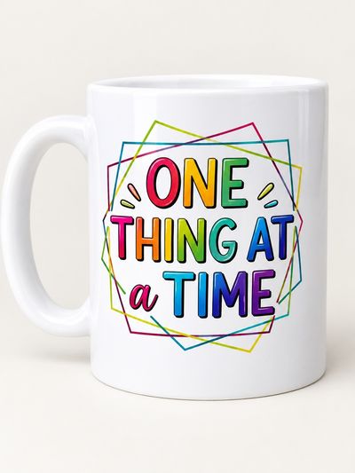 White Ceramic Mug With Colorful Text