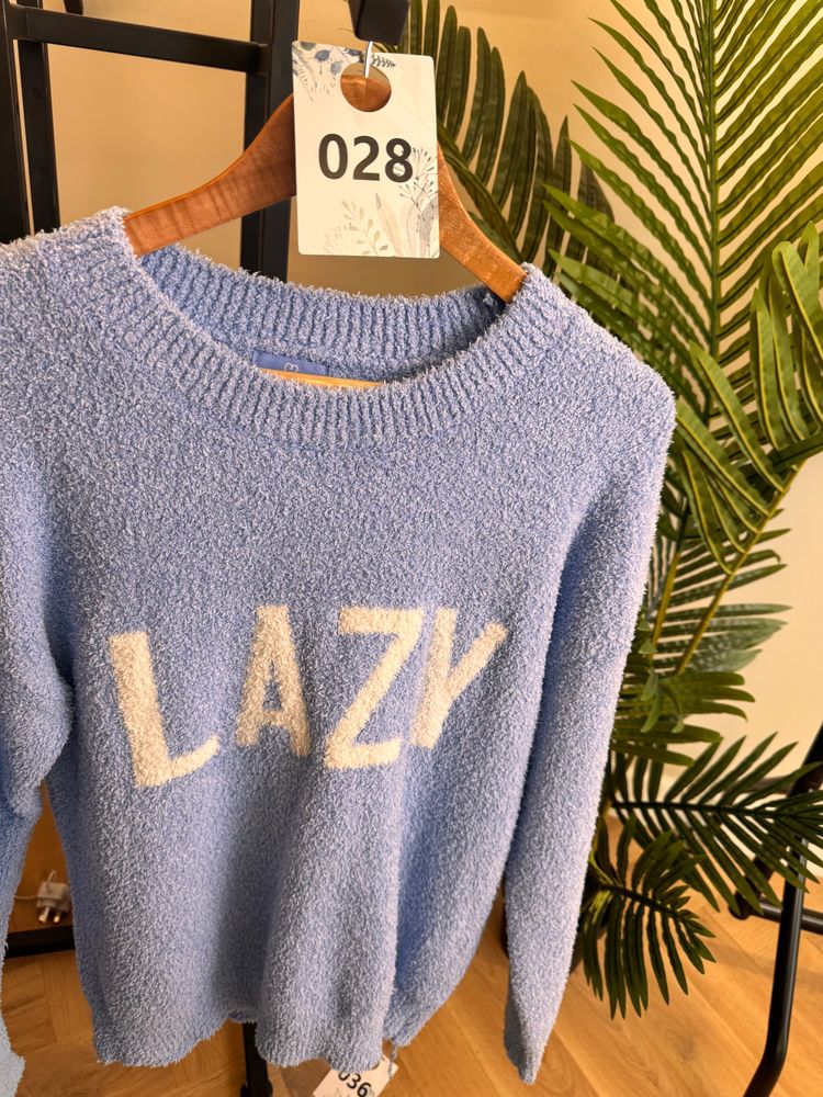 blue sweater with LAZY text