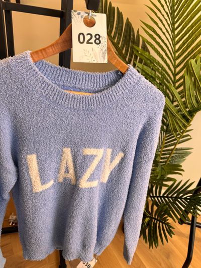 blue sweater with LAZY text