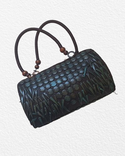 Diesel Black Handbag With Circular And Leaf Embellishments