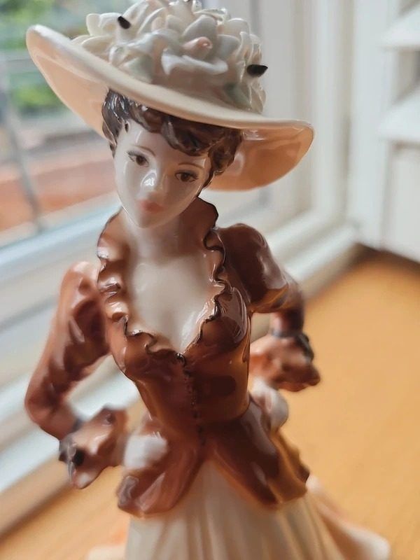 Porcelain Figurine Of A Woman In Vintage Dress And Hat image 2