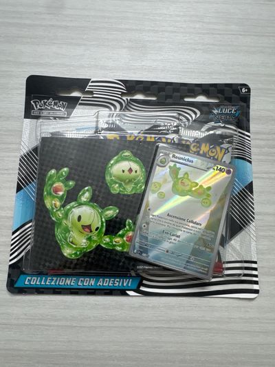 Pokémon Reuniclus luce nera, tre bustine