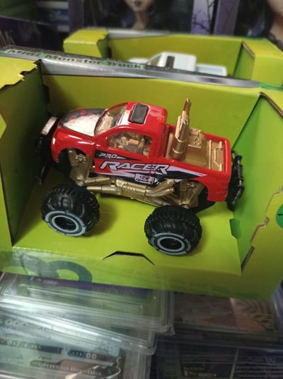 Red And Gold Toy Monster Truck