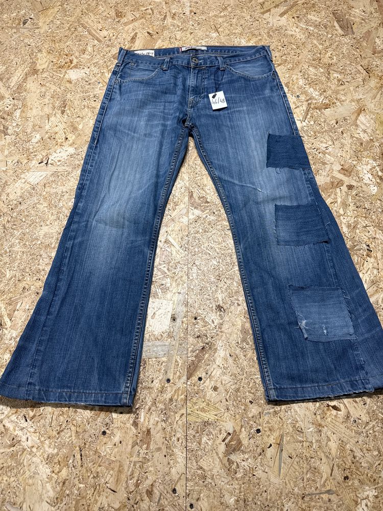 Nudie Jeans blue patched jeans product image