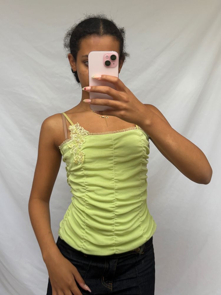 green ruched camisole top with lace detail