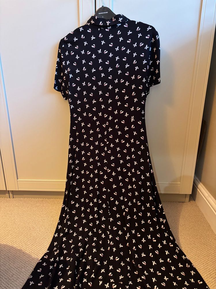 Black Dress With White Floral Pattern image 2