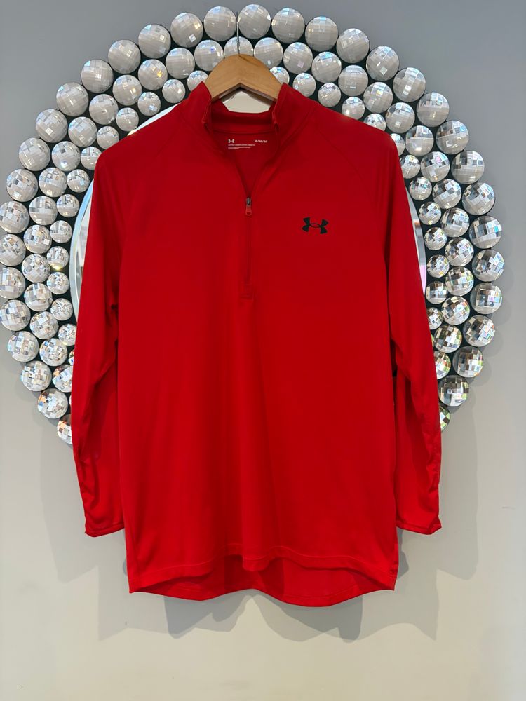 Genuine Under Armour performance 1/4 zip training top in excellent used condition.