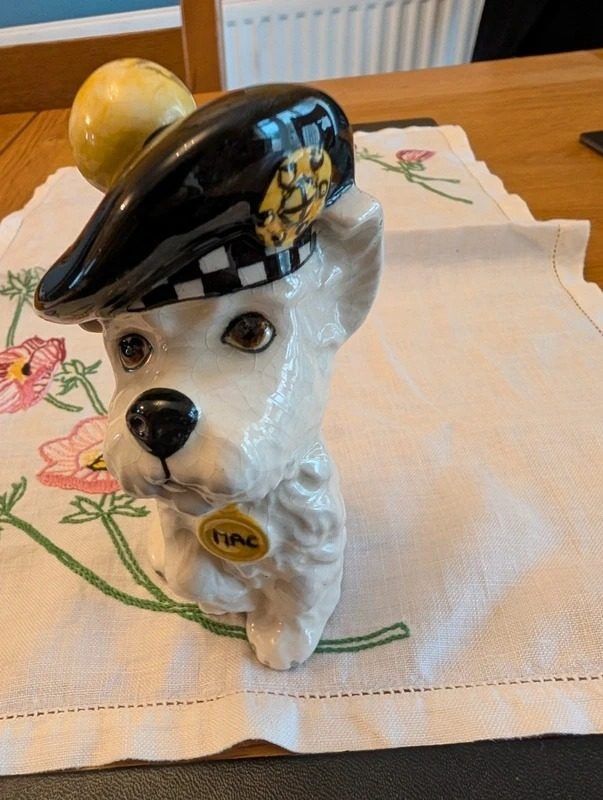 Ceramic Dog Figurine With Black Hat And Yellow Badge image 1