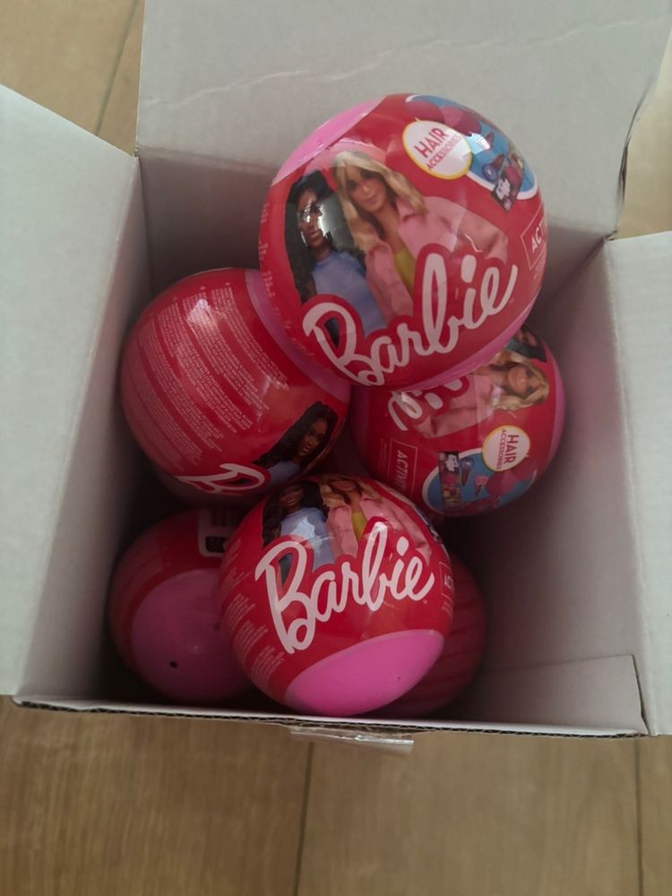 Barbie Dolls In Pink Spherical Packaging