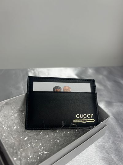 Portacarte Gucci gold logo