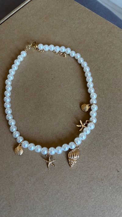 Pearl Necklace With Gold Sea-Themed Charms