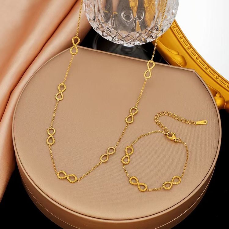 Gold Infinity Symbol Necklace And Bracelet Set image 1
