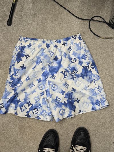 blue and white patterned shorts LV