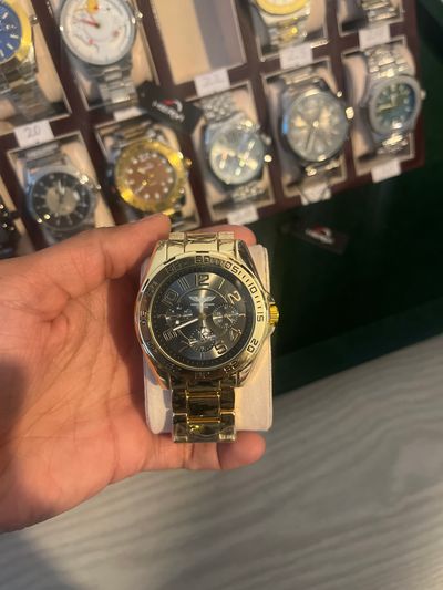 Gold And Black Wristwatch