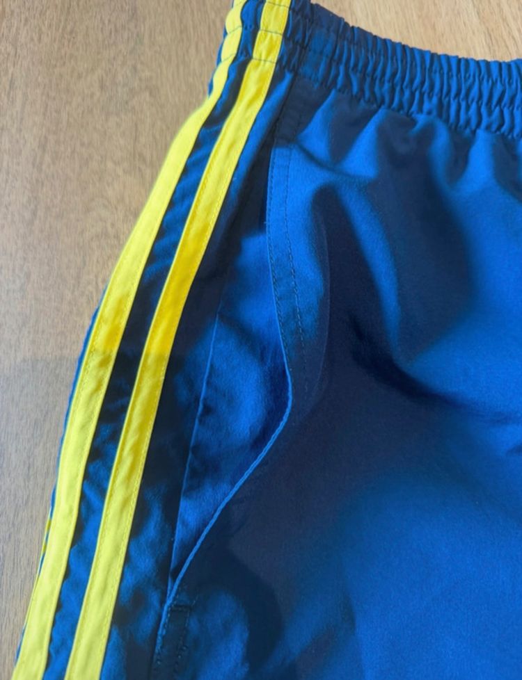 Adidas Blue Shorts With Yellow Stripes image 3