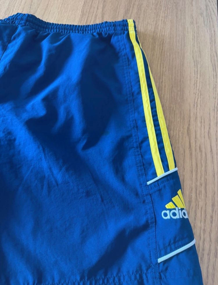 Adidas Blue Shorts With Yellow Stripes image 2