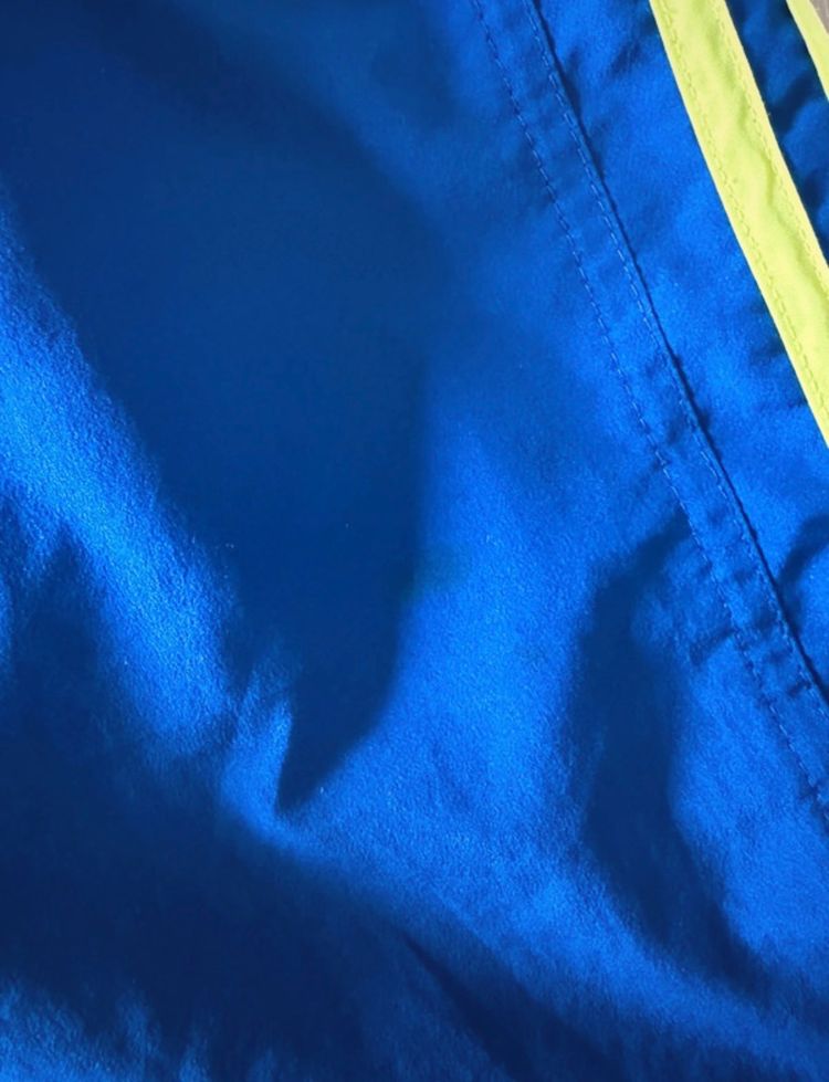 Adidas Blue Shorts With Yellow Stripes image 9