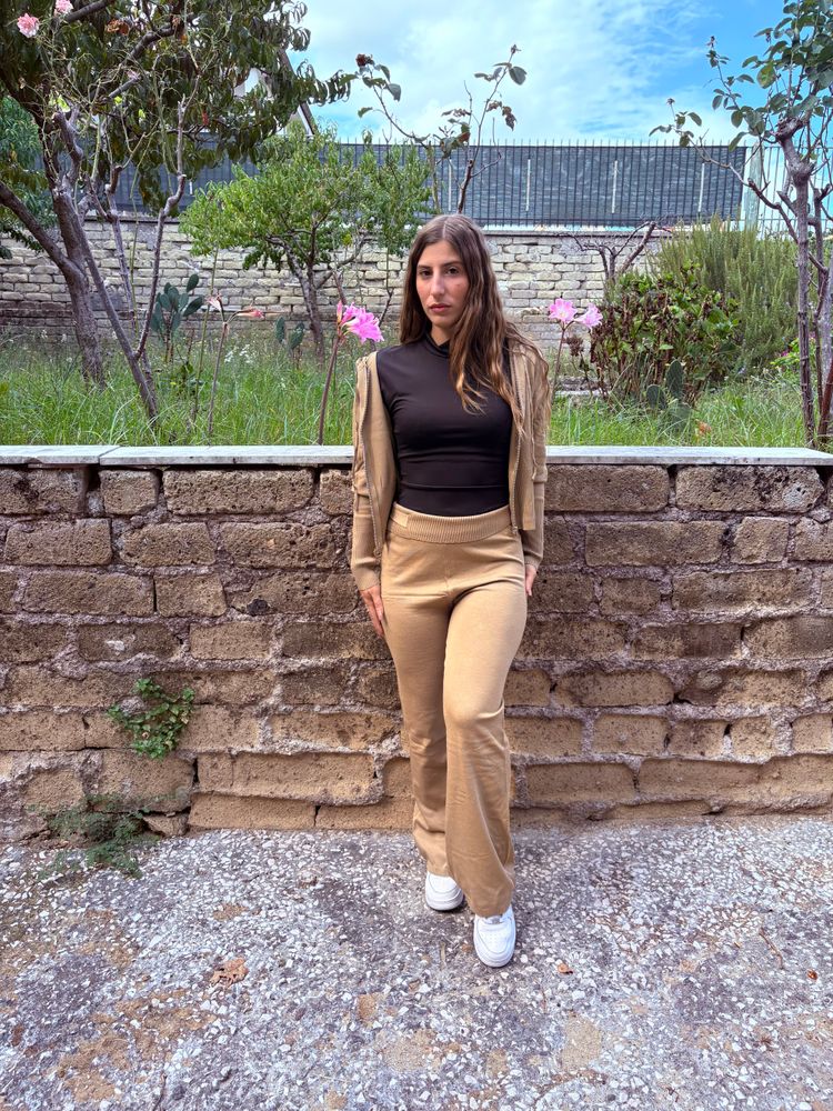 Other black long sleeve top and beige pants outfit product image
