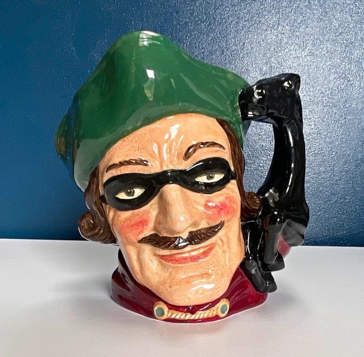 Ceramic Character Jug With Green Hat And Black Handle imagen 1