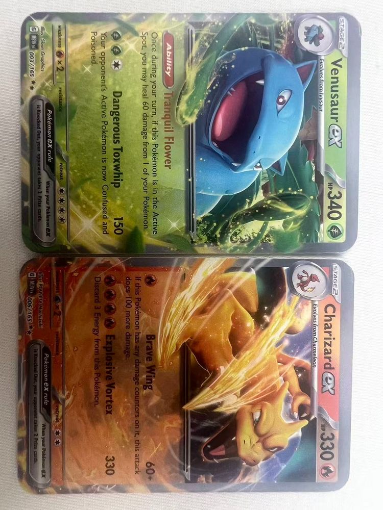 Immagine di Pokémon Trading Cards Venusaur Gx And Charizard Gx 2