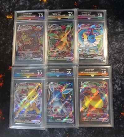 6 x GRADE 10 EEVEELUTION VMAX SLABS