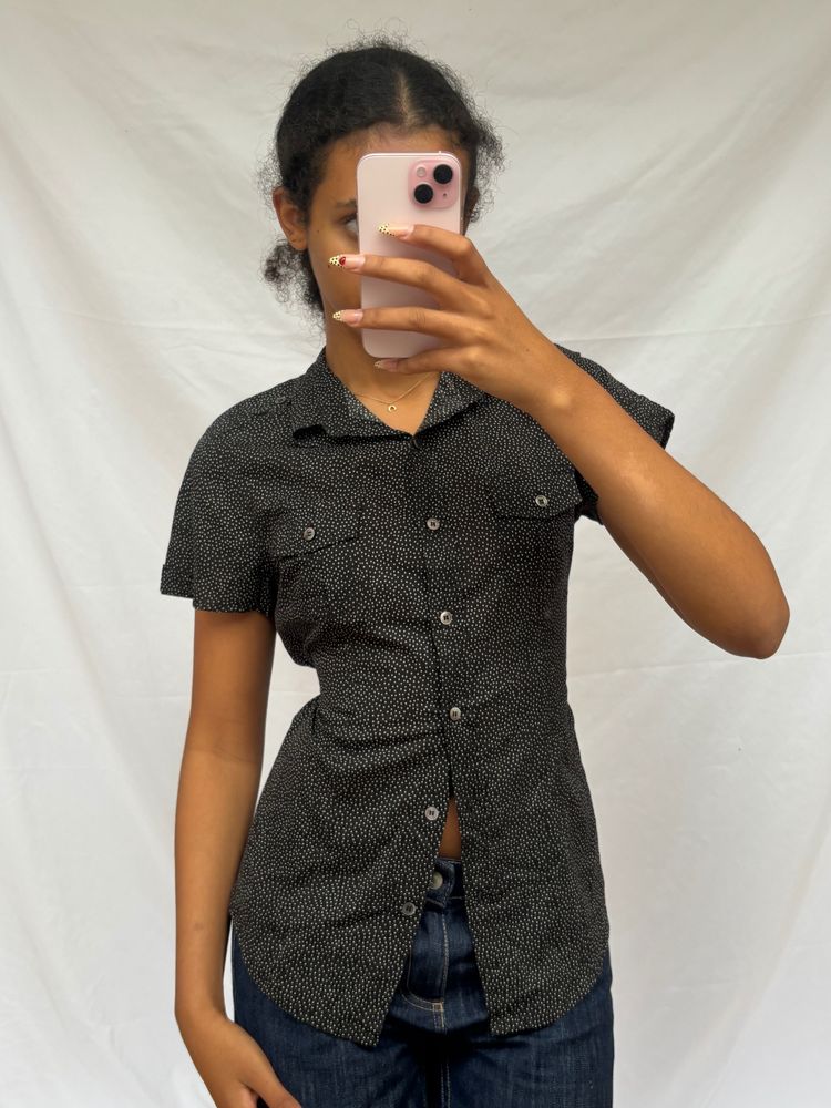 black short-sleeve button-up shirt with white dots