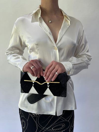 devil wears prada | black and white patterned clutch purse 1