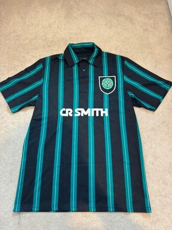 Immagine di Black And Teal Striped Polo Shirt With Crest And Cr Smith Text 1