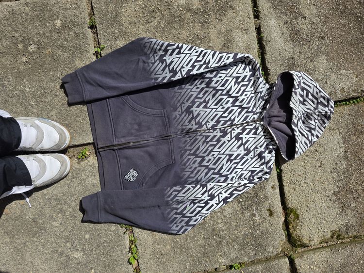 Black And White Zip-Up Hoodie With Graphic Text Pattern