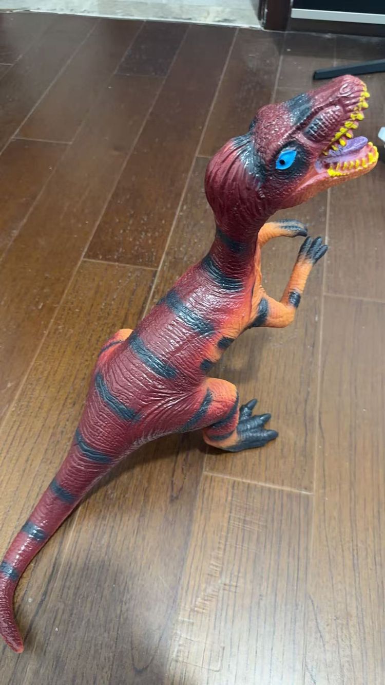 Red And Black Dinosaur Toy