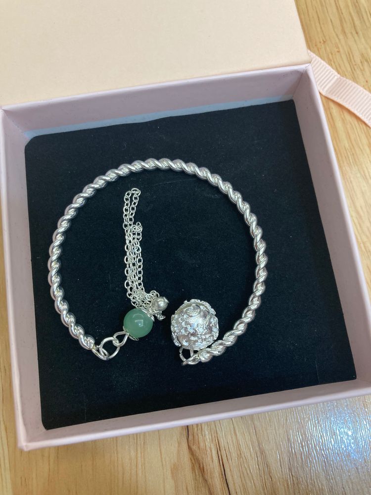 Silver Twisted Bangle Bracelet With Green Bead And Chain
