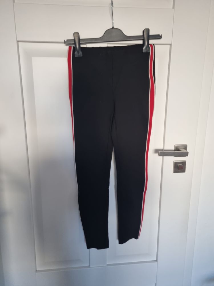 Black Pants With Red And White Side Stripes